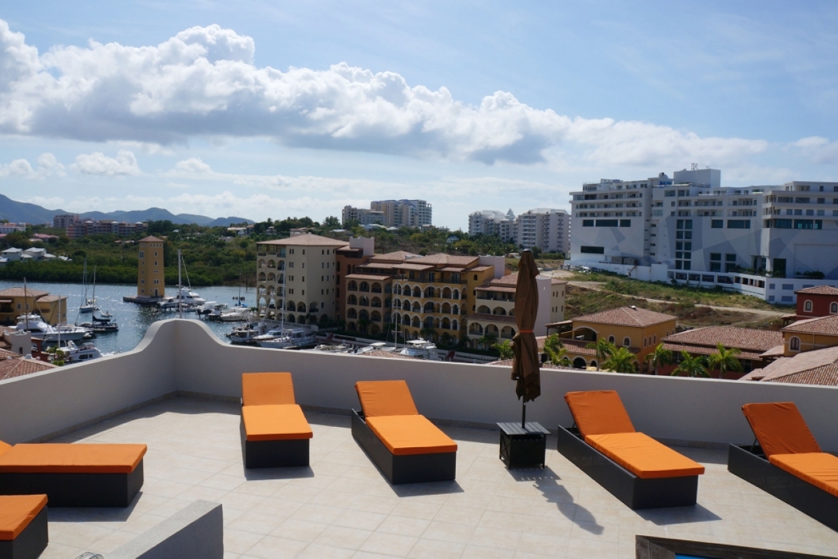 Condo Syriana  | Ocean View - Located in  Exquisite Porto Cupecoy with Private Pool